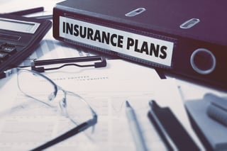 Insurance Plans - Ring Binder on Office Desktop with Office Supplies. Business Concept on Blurred Background. Toned Illustration.-1